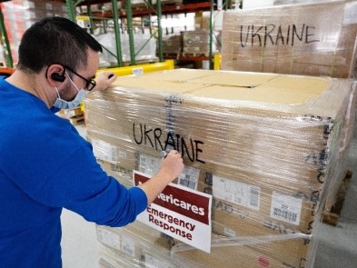 Workers in the Americares Global Distribution Center in Connecticut prepare medicine and relief supplies for the crisis in Ukraine. Photograph by Mike Demas/Americares.