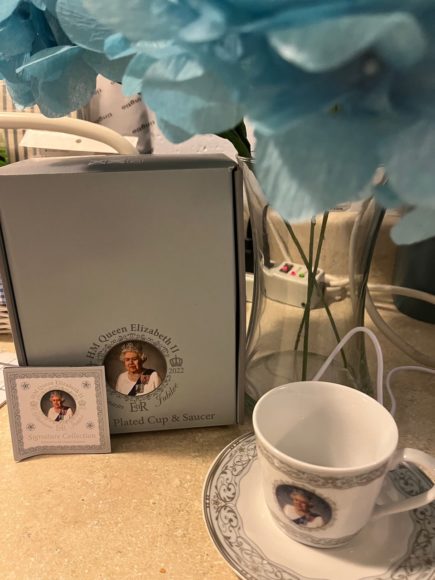 A commemorative cup and saucer with Queen Elizabeth II’s likeness, sold at The Hamlet in Mount Kisco. 