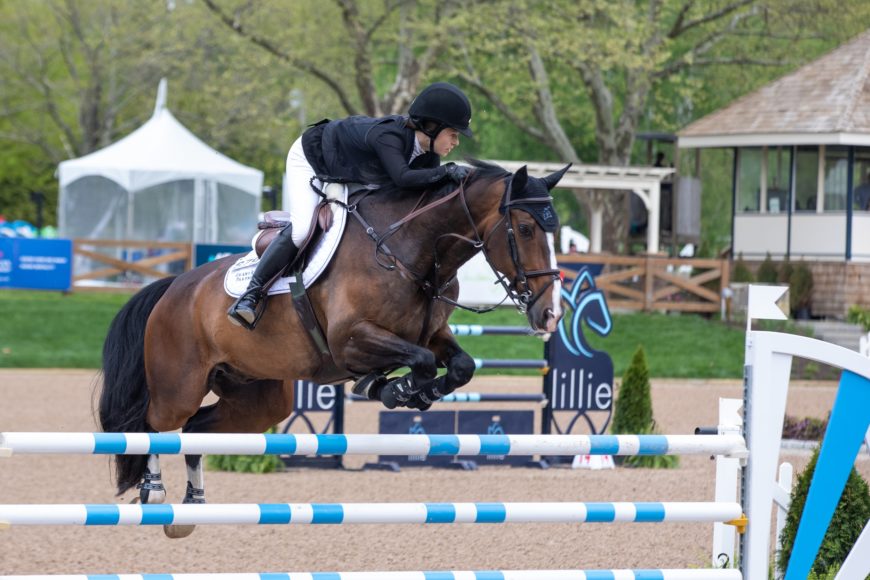 Katherine Dinan  and her 2022 FEI World Cup Finals mount, Brego R'N B, earned top honors in the May 13 Evergate Stables $40,000 1.50m New York Welcome Stake, presented by Jumpr App at the Old Salem Farm Spring Horse Shows in North Salem. Photograph by RandolphPR.
