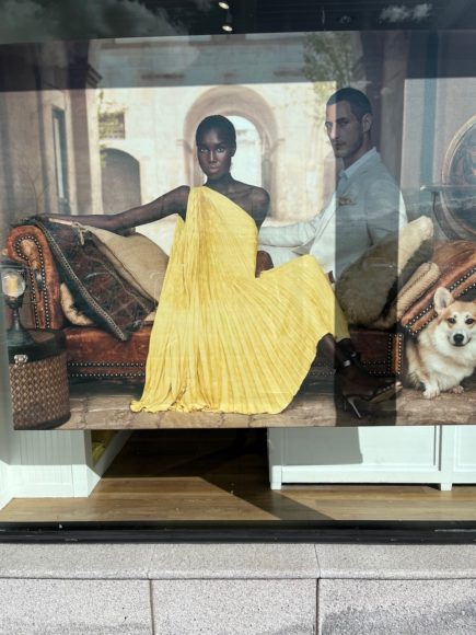 The Banana Republic window at its Eastchester location features the brand’s fetching one-shoulder pleated yellow dress, $200. Photograph by Georgette Gouveia.