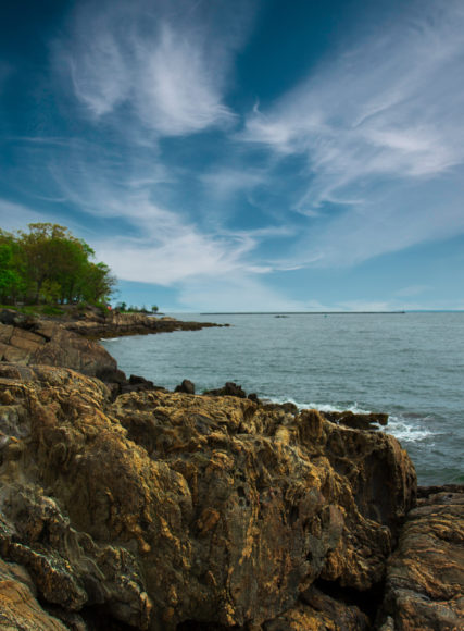 The Long Island Sound's rocky coastline as seen from Larchmont. Photograph by Alexandra Cali.