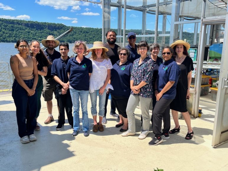 Thursday Club members Pat Ellis (far right, back) and Leslie Allen (center) with Brigitte Griswold (glasses on head) and the Groundwork Hudson Valley Green Team. Photographs courtesy The Thursday Club.