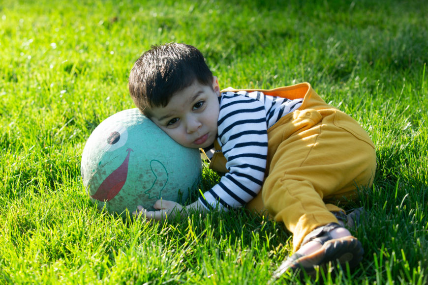 The Shahs' younger son, Asher, has a ball. Right, Hiral Shah with sons Bodhi and Asher. 