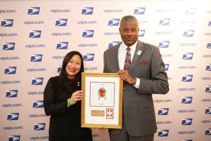 Michelle Yun Mapplethorpe and Ronald A. Stroman, governor of the United States Postal Service, at the Lunar New Year-Year of the Tiger Commemorative Forever Stamp First Day of Issue Dedication Ceremony. Photographs courtesy USPS.