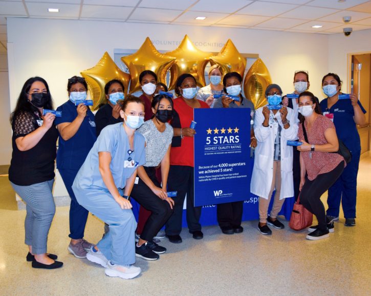 The hospital team celebrates their CMS 5-star ranking.
